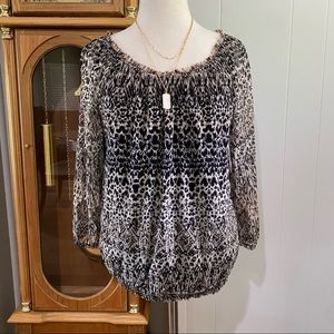Striking animal print top!